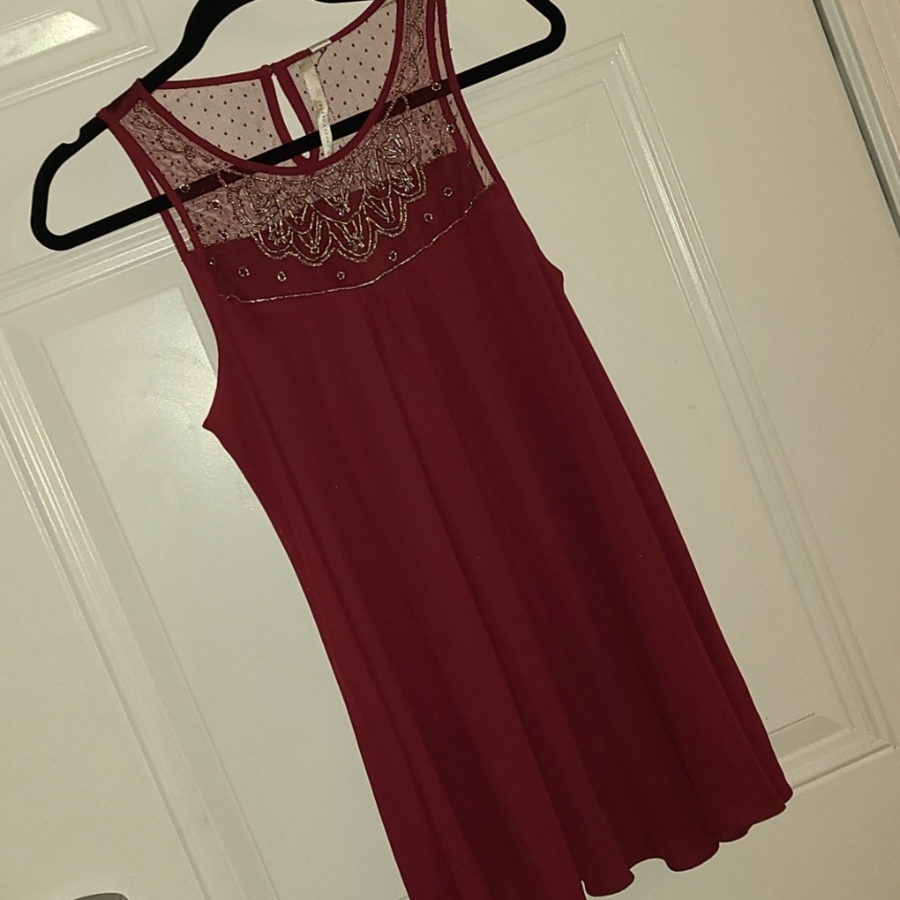 LC Lauren Conrad beaded Burgundy top in size S.